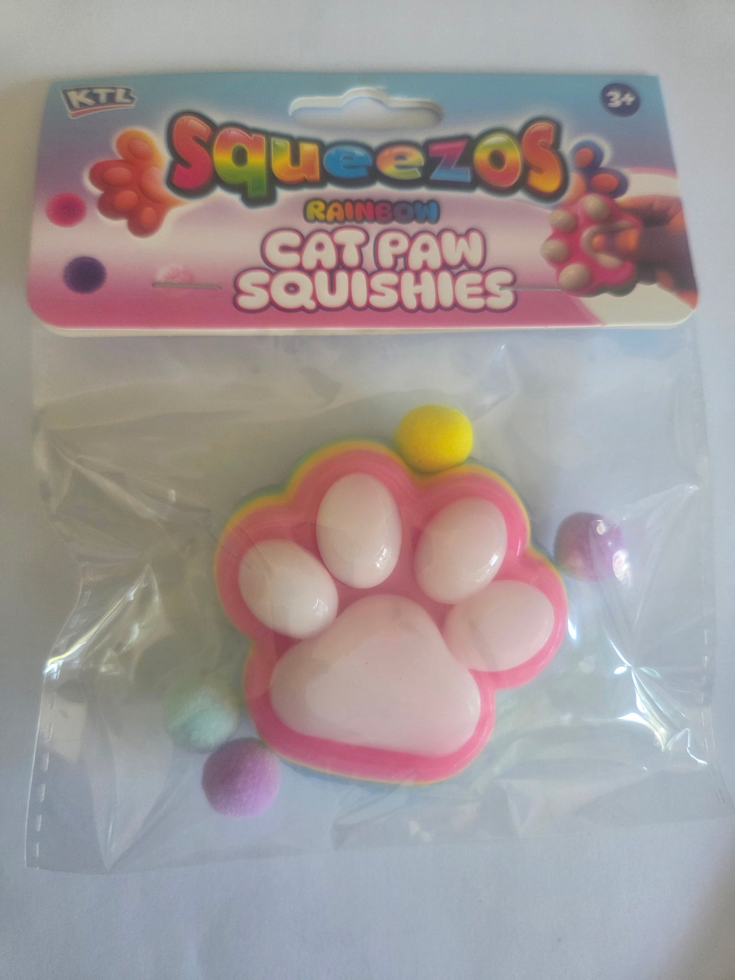 Squeezos rainbow cat paw squishies